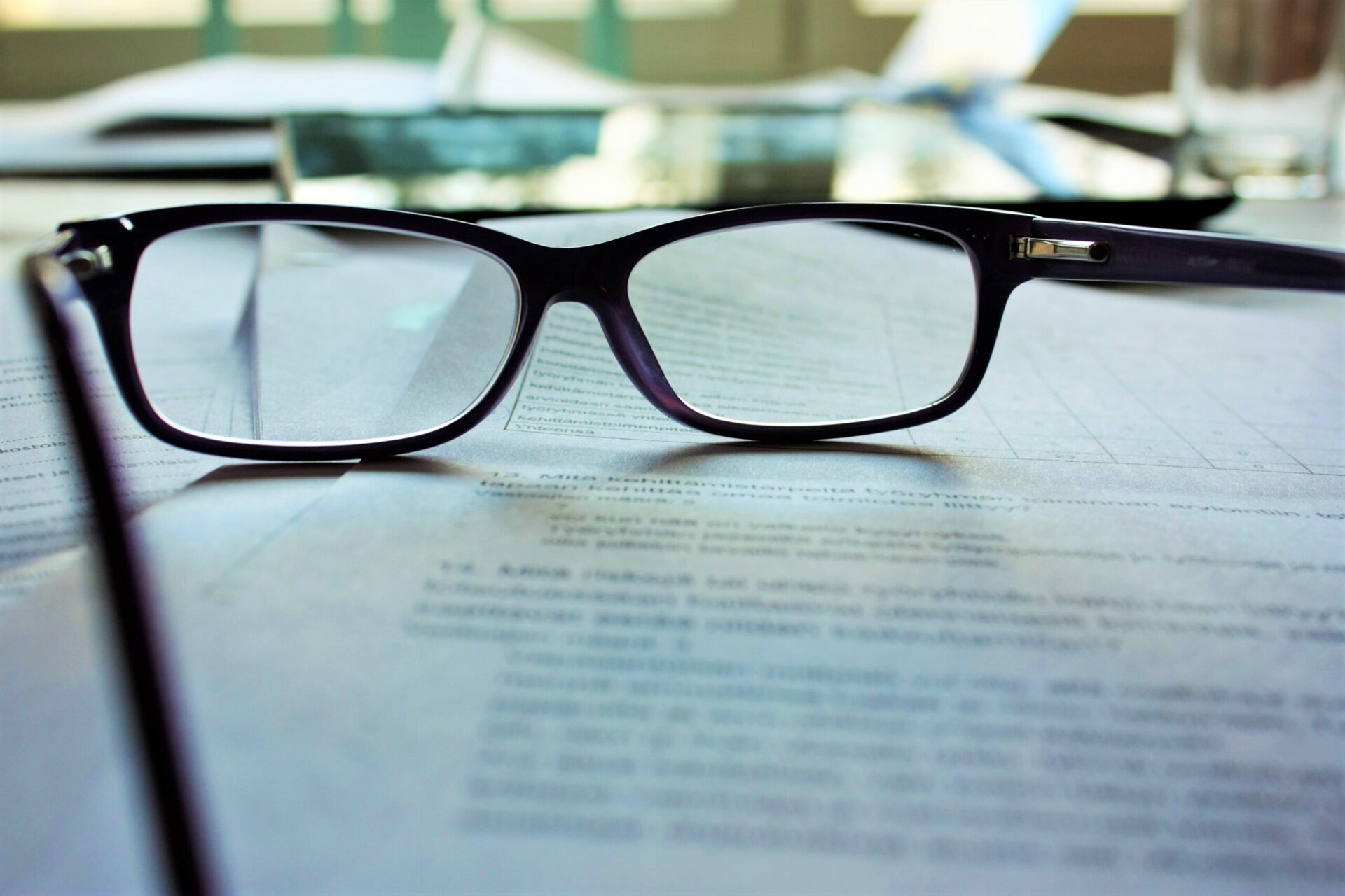 Glasses laying on documents